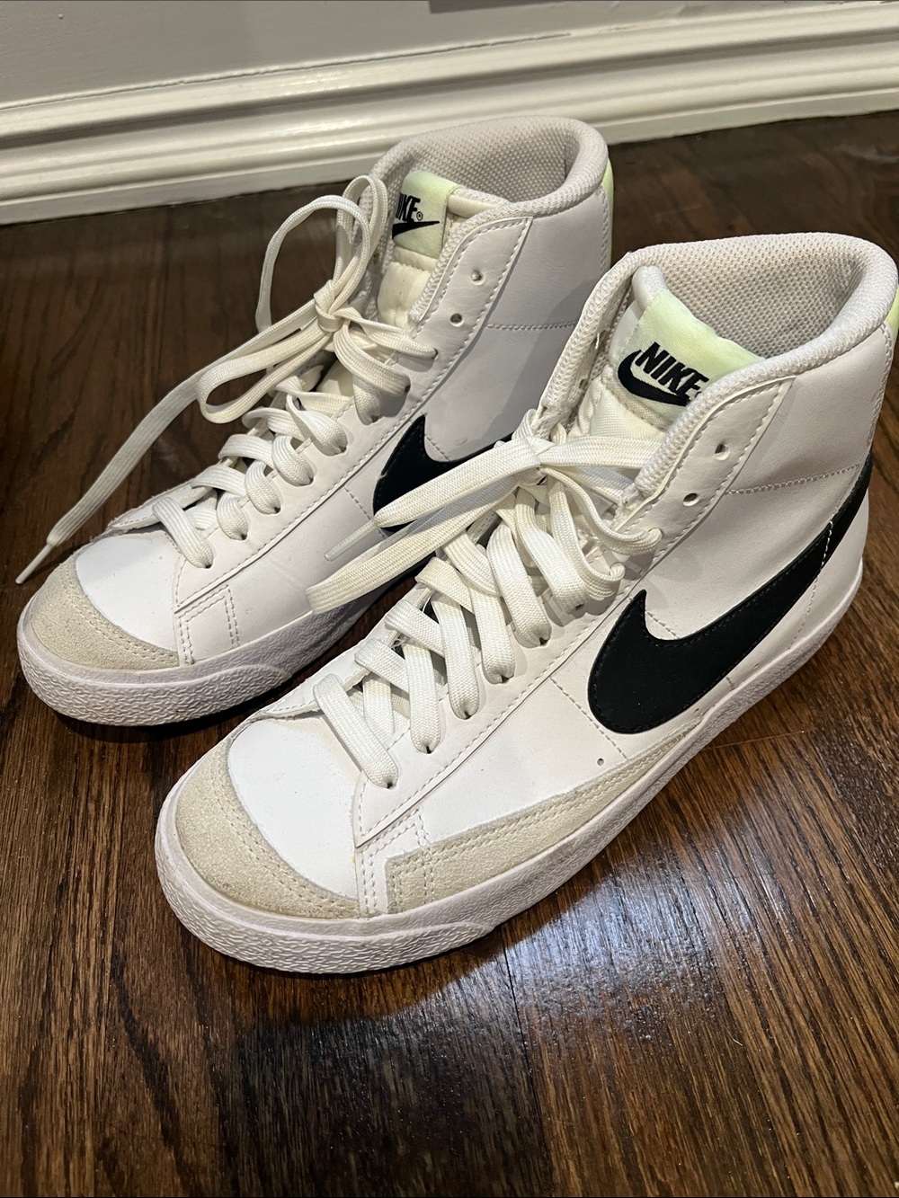 Nike Youth White High-Top Sneakers with Black Swoosh